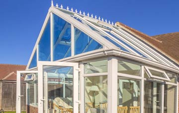 conservatory roof insulation costs Caergeiliog